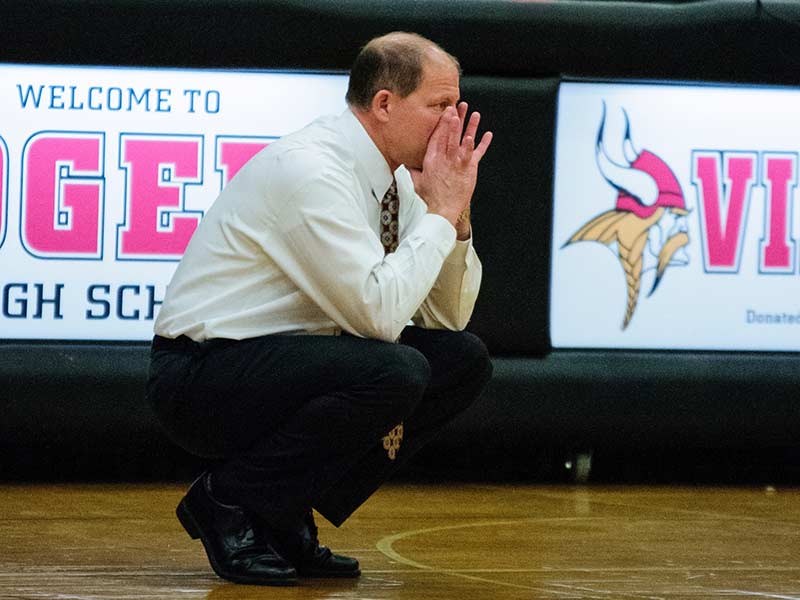 Coach Jim Psaras coaching at Rogers High School in Newport