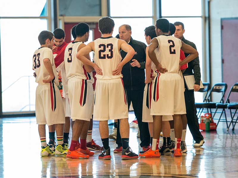 Coach Psaras with Rogers Basketball team in 2014