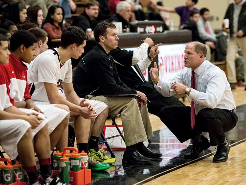 Coach Psaras coaching at Rogers in 2014