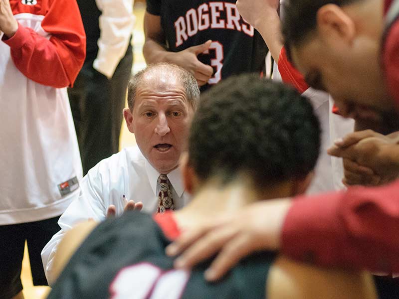 Jim Psaras coaching Rogers basketball in 2012